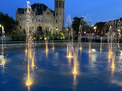 A photo shows the splash pad at National Corner in downtown Tiffin during the evening light show